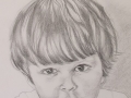 A grandmother commissioned this portrait for her son and daughter-in-law