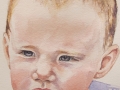 This portrait captures the intelligence and gentle nature of the child