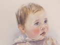 This image captures the innocence of a baby boy